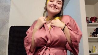 Goth girl gives playful strip tease dance in silk robe - porn video